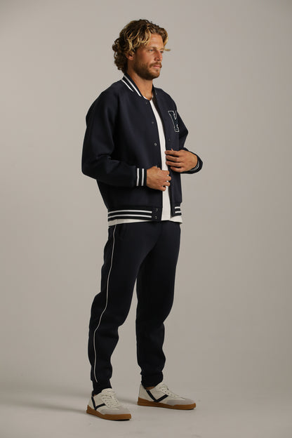 מכנסי ג'וגר בגזרת טייפר עם פס בצד | קנת קול